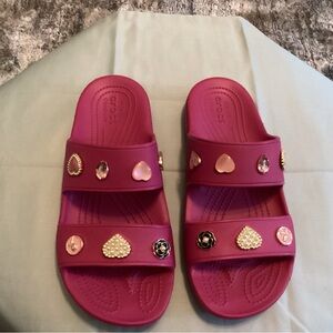 Womens raspberry crocs size 10 never worn.